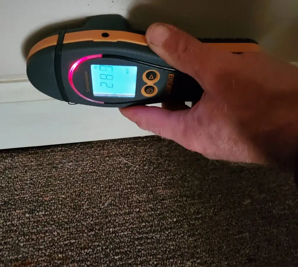 Moisture detection at baseboard during Storm Damage Restoration in Uniontown